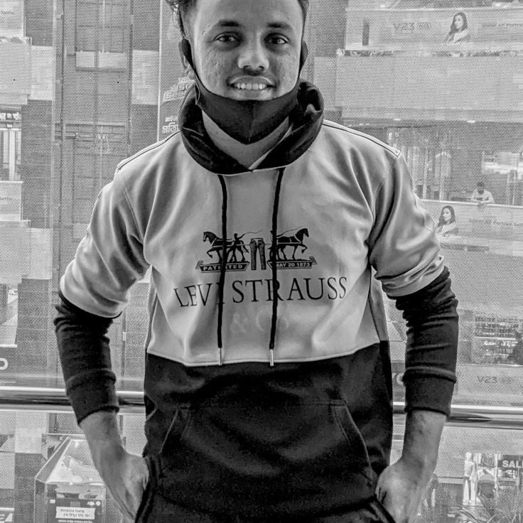 Portrait of Maya Chen, group coordinator and fusion cooking expert